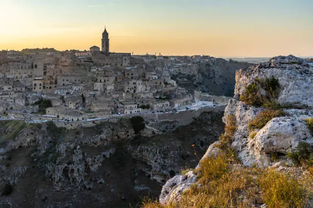 Scenic view of Matera Sassi district from the viewpoint of Belvedere Murgia Timone at sunset, Basilicata, Italy