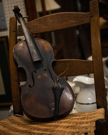 Old violin for sale at a flee market