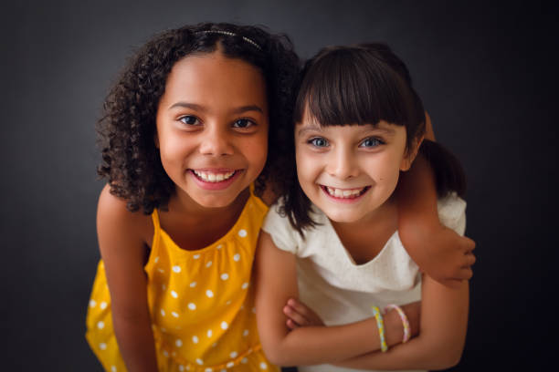 istock Two Interracial Girls' Friendship 1296233158