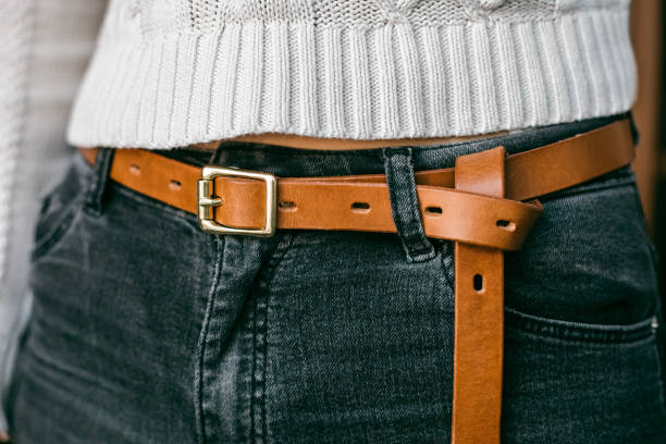 istock Man in jeans with fashionable leather belt. 1296235411