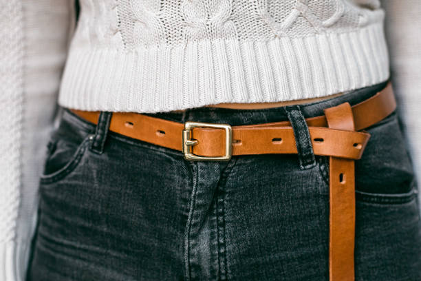 istock Man in jeans with fashionable leather belt. 1296235418