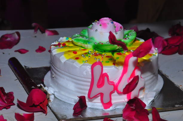 istock Milkcake view surrounded by flowers at a party 1296251140