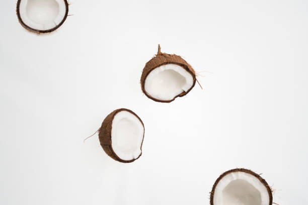 istock simple minimalistic raw cracked coconut raw nuts isolated top view 1296253835