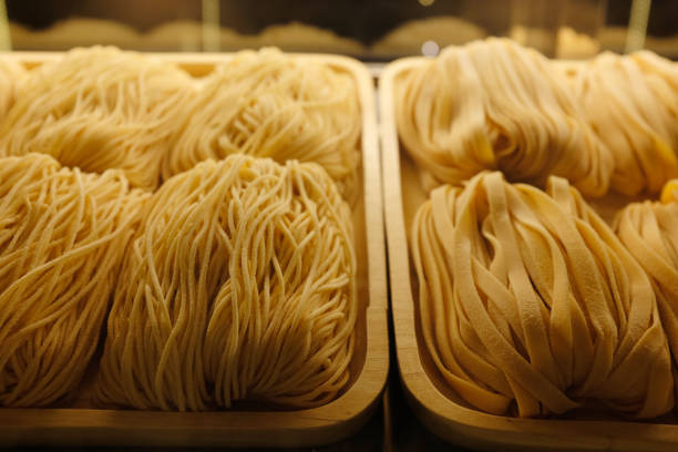 istock Homemade pasta process. Finished pasta on refrigerator. 1296255567