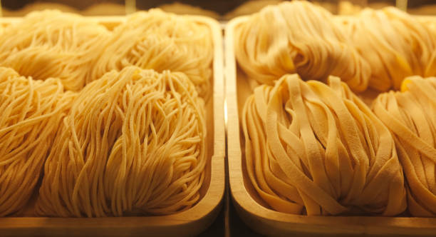 istock Homemade pasta process. Finished pasta on refrigerator. 1296255568