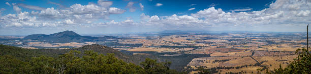 istock Extra wide aerial panorama of fields and clouds in Australia 1296257449