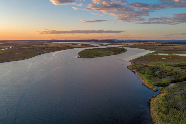 istock Snowy River Estuary at dusk - aerial view. 1296259034