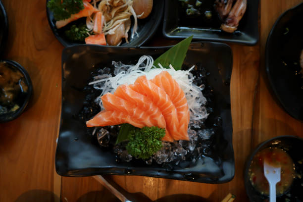 istock raw salmon or sliced salmon, salmon sashimi 1296259110