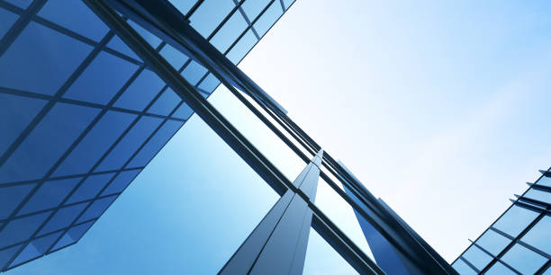 istock Low angle view of futuristic architecture, Skyscraper office building with cloud reflected on window, 3D rendering. 1296260483