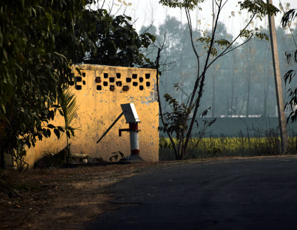 istock Old water pump from metal in village 1296261294