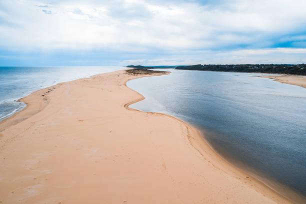 istock Patch of sand at ocean coastline in Australia 1296262108