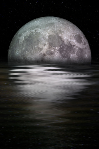 Blue moon rising out of the sea. Elements of this image furnished by NASA.\n\n/urls:\nhttps://images.nasa.gov/details-GSFC_20171208_Archive_e000868.html\nhttps://solarsystem.nasa.gov/resources/429/perseids-meteor-2016/