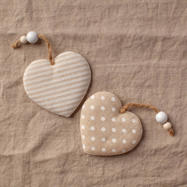 istock Flatlay hearts on a linen tablecloth. Valentine's Day background. Copy space. 1296266353
