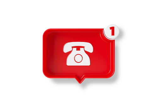 Red chat bubble with white telephone symbol on white background. Horizontal composition with copy space. Voice mail concept.