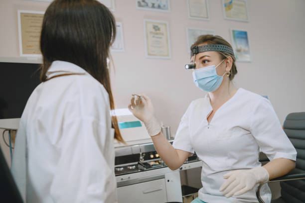 istock Otolaryngologist preparing for the medical examination procedure 1296268482