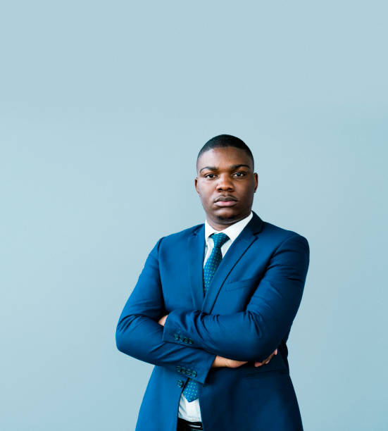 istock Confident male entrepreneur with arms crossed 1296271218