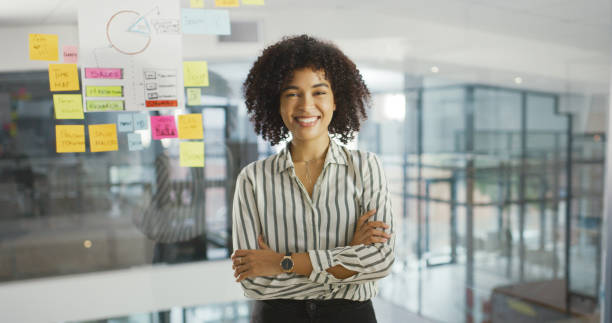 Did someone call for a project manager Shot of a young businesswoman having a brainstorming session in a modern office project manager stock pictures, royalty-free photos & images