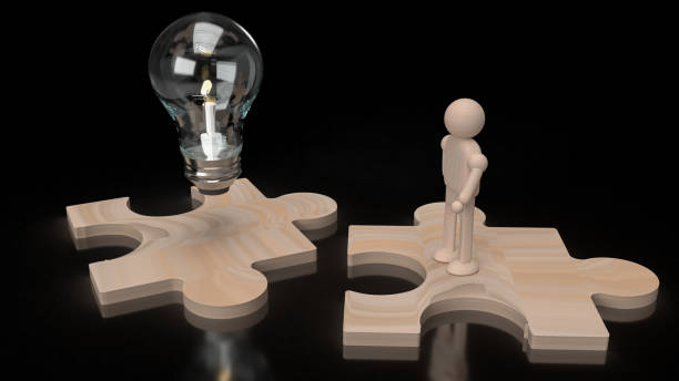 istock The Light bulb and wood human figure on jigsaw 3d rendering. 1296274013