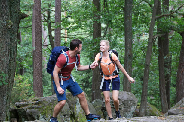 istock Young couple hiking in the Palatinate forest (Pälzerwald), Germany 1296275662