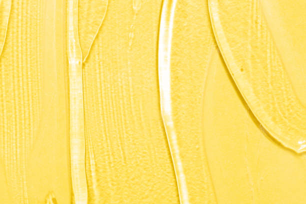 Yellow color paint stain on a white wall - home decoration concepts