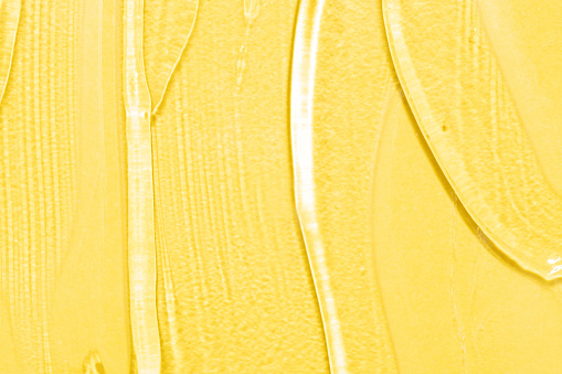 yellow transparent gel macro close up texture with selective focus