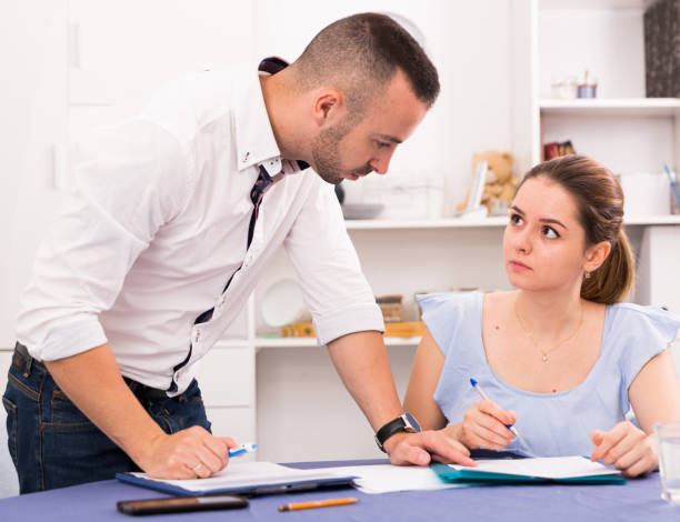 istock Couple is reading the marriage contract 1296285271