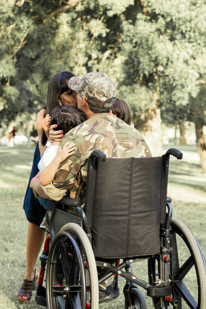 istock Disabled retired military father returning home 1296285285