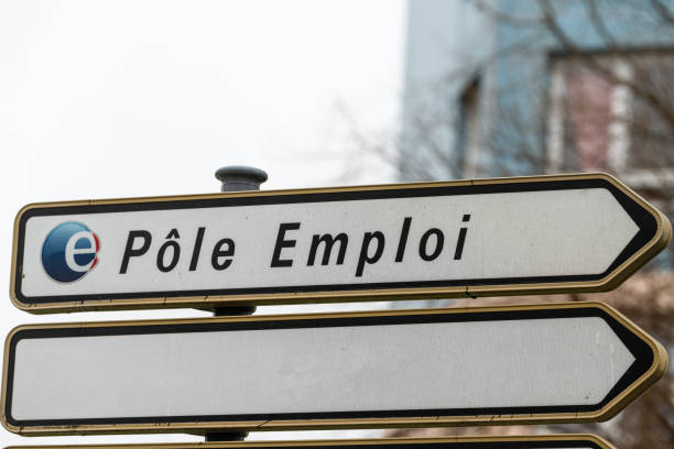 pole emploi logo on signboard. pole emploi is a french governmental agency which registers unemployed people - unemployment imagens e fotografias de stock