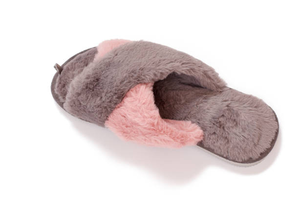 istock Soft slippers isolated on white background. Top view 1296293625