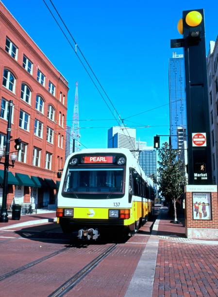 Downtown transportation system with skyscrapers to rear, Dallas, Texas, USA.