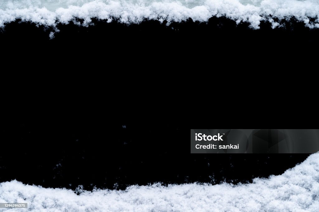 White snow borders isolated on black background Snow Stock Photo