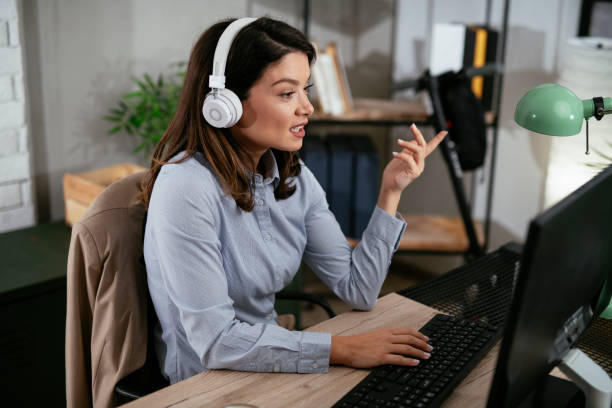 istock Businesswoman is having a video call on computer. 1296299041
