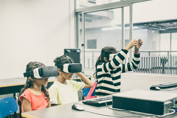 istock Cute multiethnic kids learning to use virtual reality glasses 1296299240