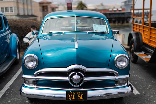 Havana, Cuba - September 28, 2015: Classic american car park on street of Old Havana,Cuba. Classic American cars are typical landmark and tourist attraction for whole Cuban island.