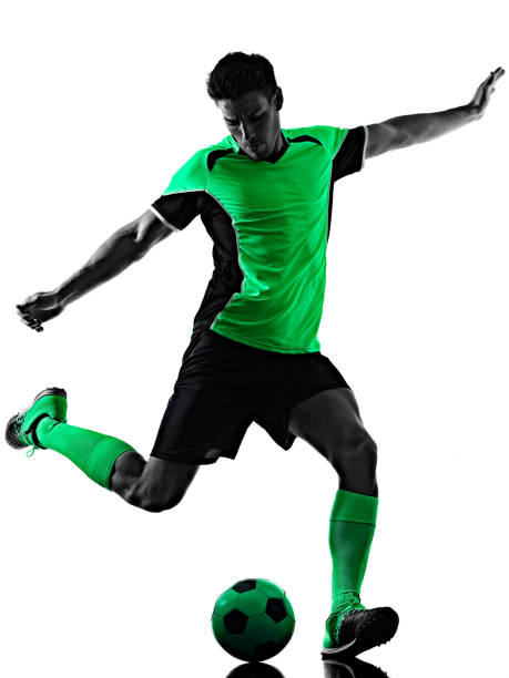 istock young soccer player man silhouette shadow isolated white background 1296300404