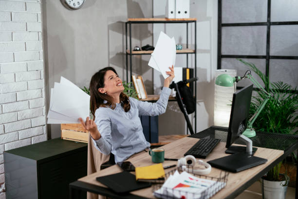 istock Businesswoman celebrating a big accomplishment at work 1296301486