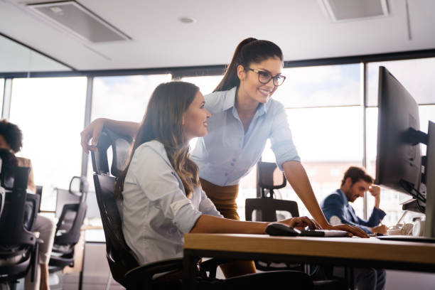 istock Startup business people group of programmer working as team to find solution to problem 1296303343