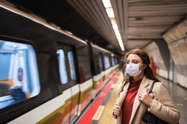 istock Portrait of beautiful girl wearing protective medical mask