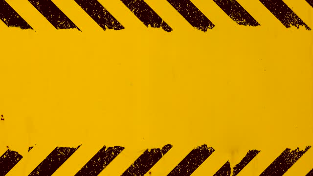 Yellow background with black grunge hazard sign