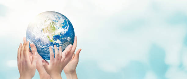 istock Earth globe in family hands. World environment day 1296308141