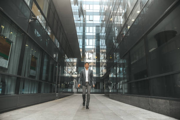 istock Businessman rushing to a meeting 1296311545