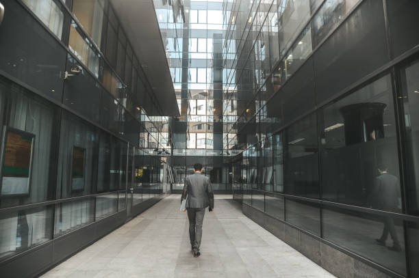istock Businessman rushing to a meeting 1296311604