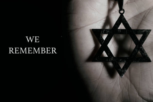 istock star of david in a pendant and text we remember 1296311955