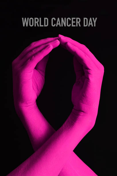 istock pink ribbon and text world cancer day 1296312077
