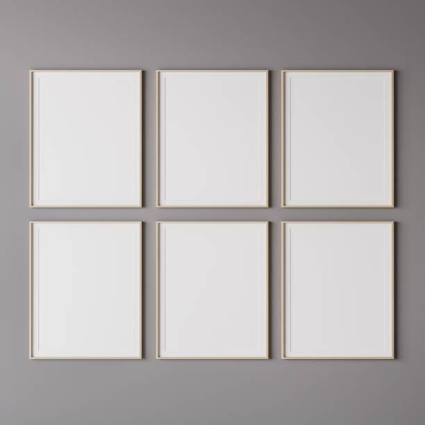 istock Six wooden vertical frame mockup on gray wall 1296312995
