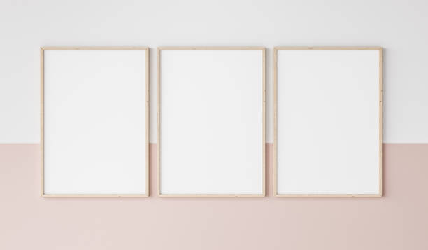 trois cadres en bois sur le mur rose et blanc, maquette de cadre - colors white art group of objects photos et images de collection