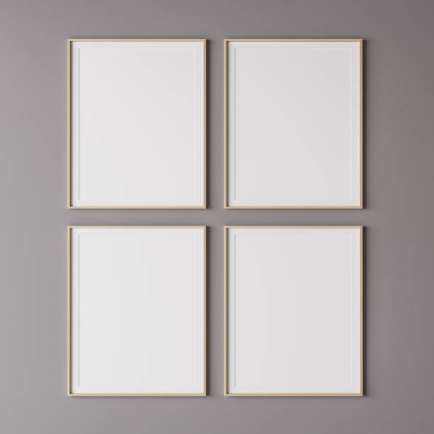 istock Four wooden vertical frame mockup on gray wall 1296313000