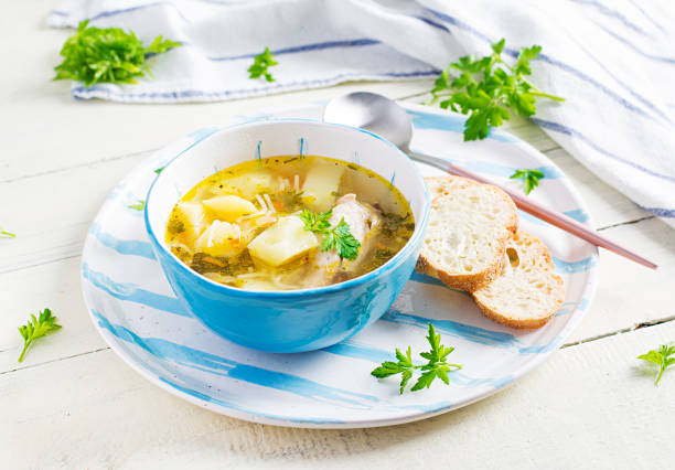 istock Chicken soup with noodles and vegetables in bowl. 1296313140