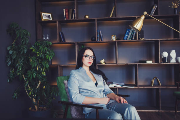 istock elegant woman in a silk suit 1296313188