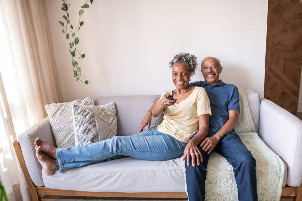 istock Senior couple watching TV 1296315427